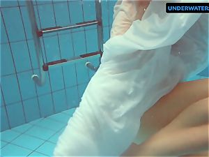 redhead Diana warm and insane in a white dress