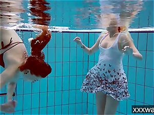 hot Russian damsels swimming in the pool