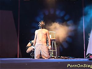 insane fetish injection needle flash on stage