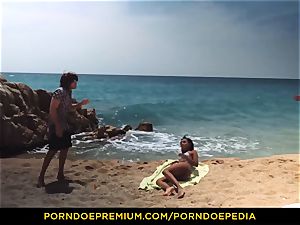 PORNDOE PEDIA sumptuous black babe beach hump tutorial
